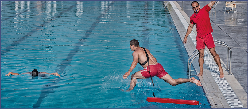 Lifeguard training course - rescuing victim from swimming pool